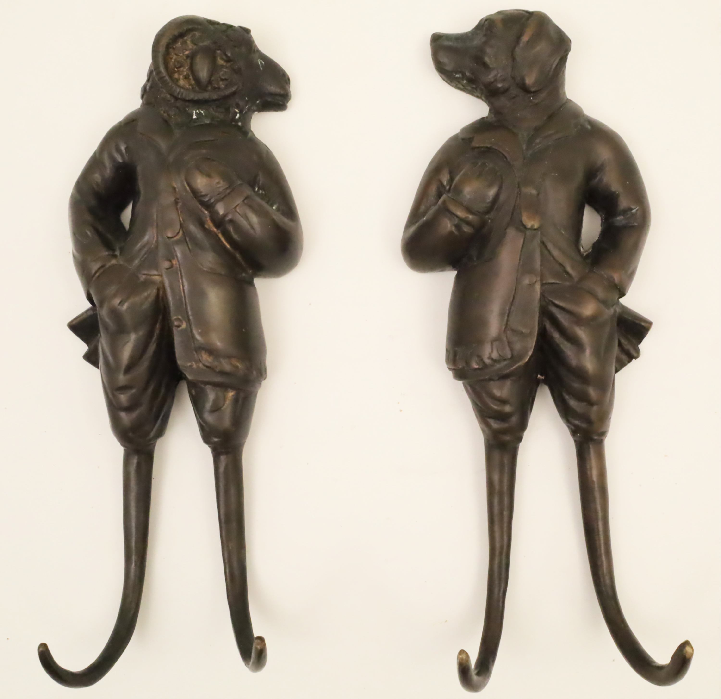 Appraisal: PAIR OF WHIMSICAL BRONZE MEAT OR COAT HOOKS Pair of