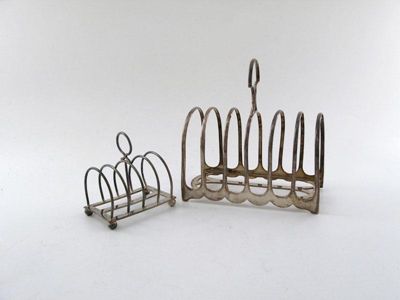 Appraisal: A Victorian silver seven bar toast rack plain arched form