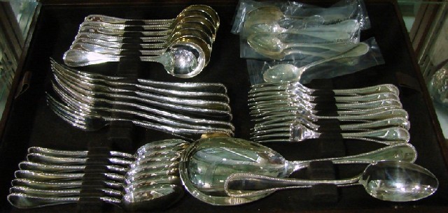 Appraisal: A Christofle cased canteen of silver plate flatware in the