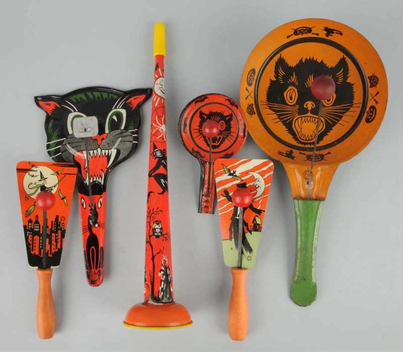 Appraisal: Lot of Tin Halloween Noisemakers Description One made by Chein