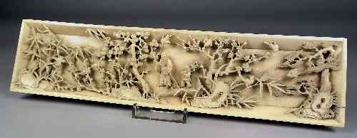 Appraisal: A Chinese ivory rectangular panel carved with a scholar and