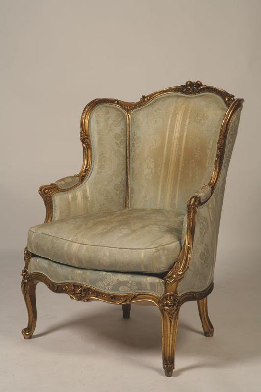 Appraisal: A LOUIS XV STYLE GILTWOOD ARMCHAIR with a carved scrolling