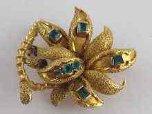 Appraisal: A yellow metal tests carat gold brooch designed as a