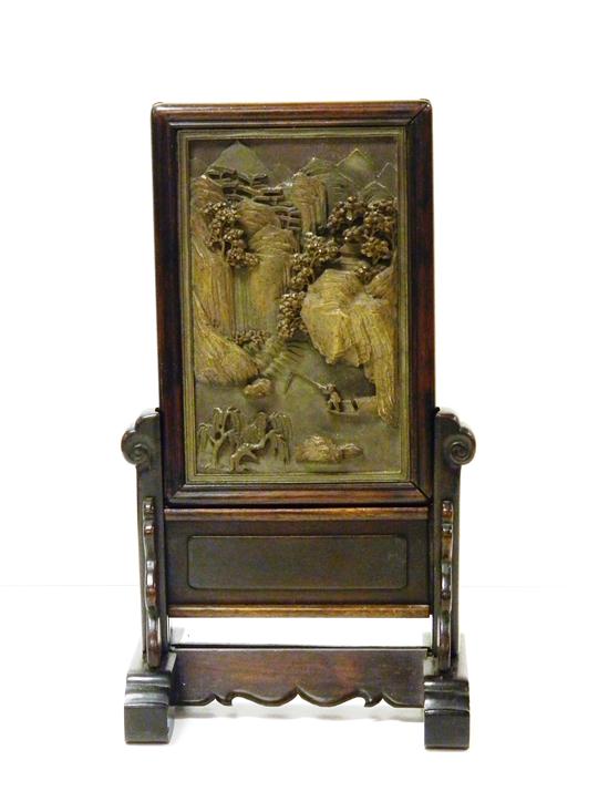 Appraisal: Asian carved stone table screen with fitted wood stand sharply