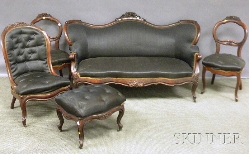 Appraisal: Victorian Rococo Revival Horsehair Upholstered Carved Walnut Sofa and Four-piece