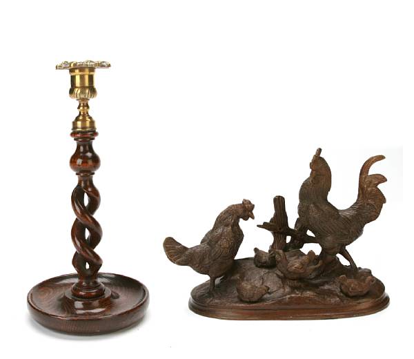 Appraisal: A patinated bronze animalia group together with two pairs of