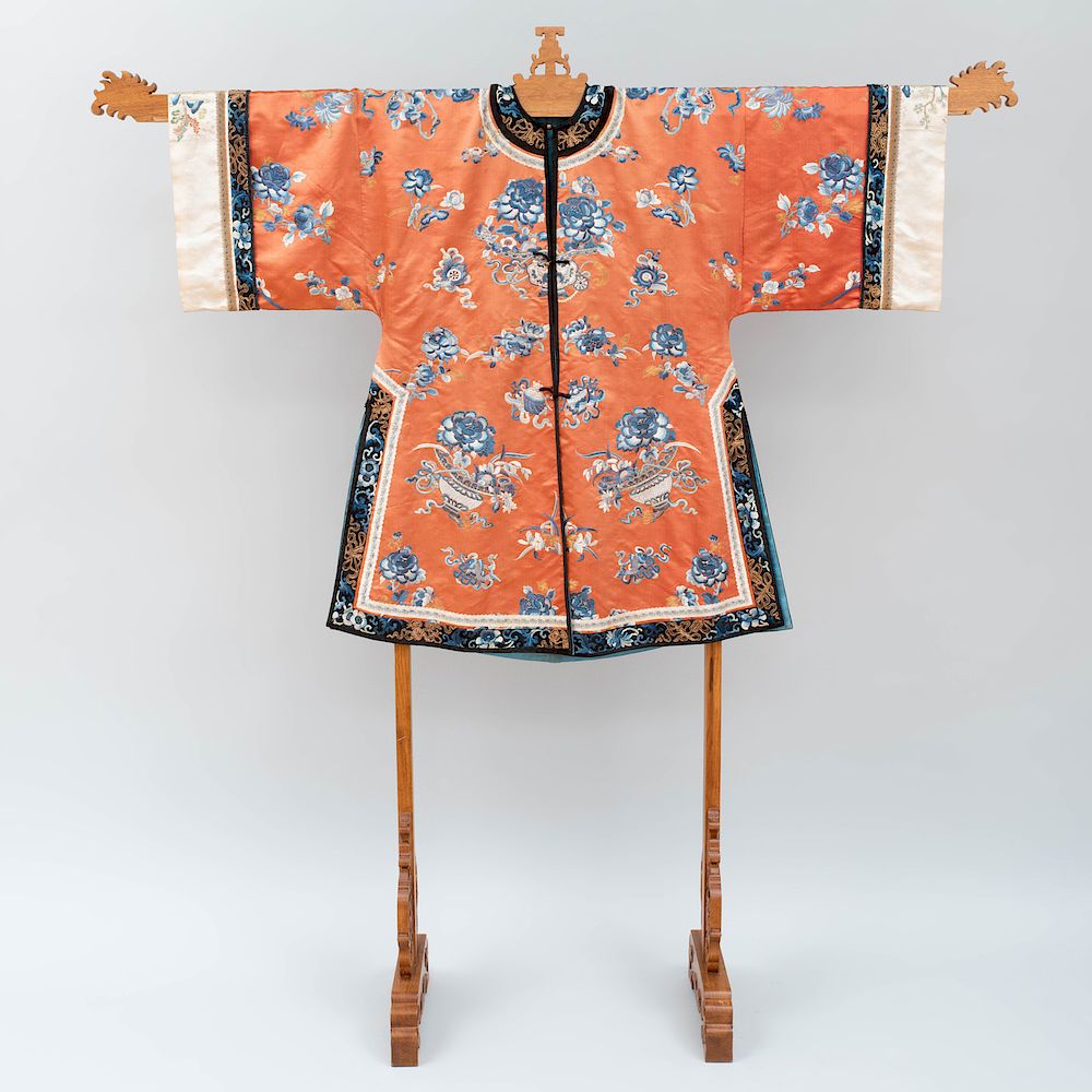 Appraisal: Chinese Silk Embroidered Jacket Together with a Chinese carved teak