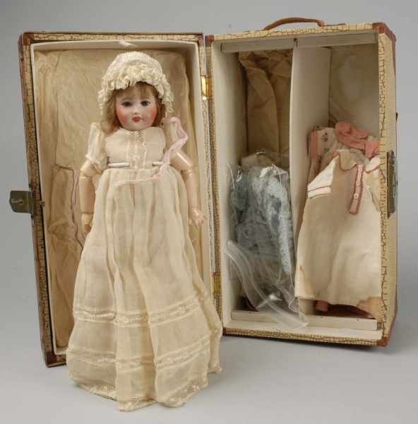 Appraisal: Desirable French Doll Ensemble Description From Au Nain Bleu store