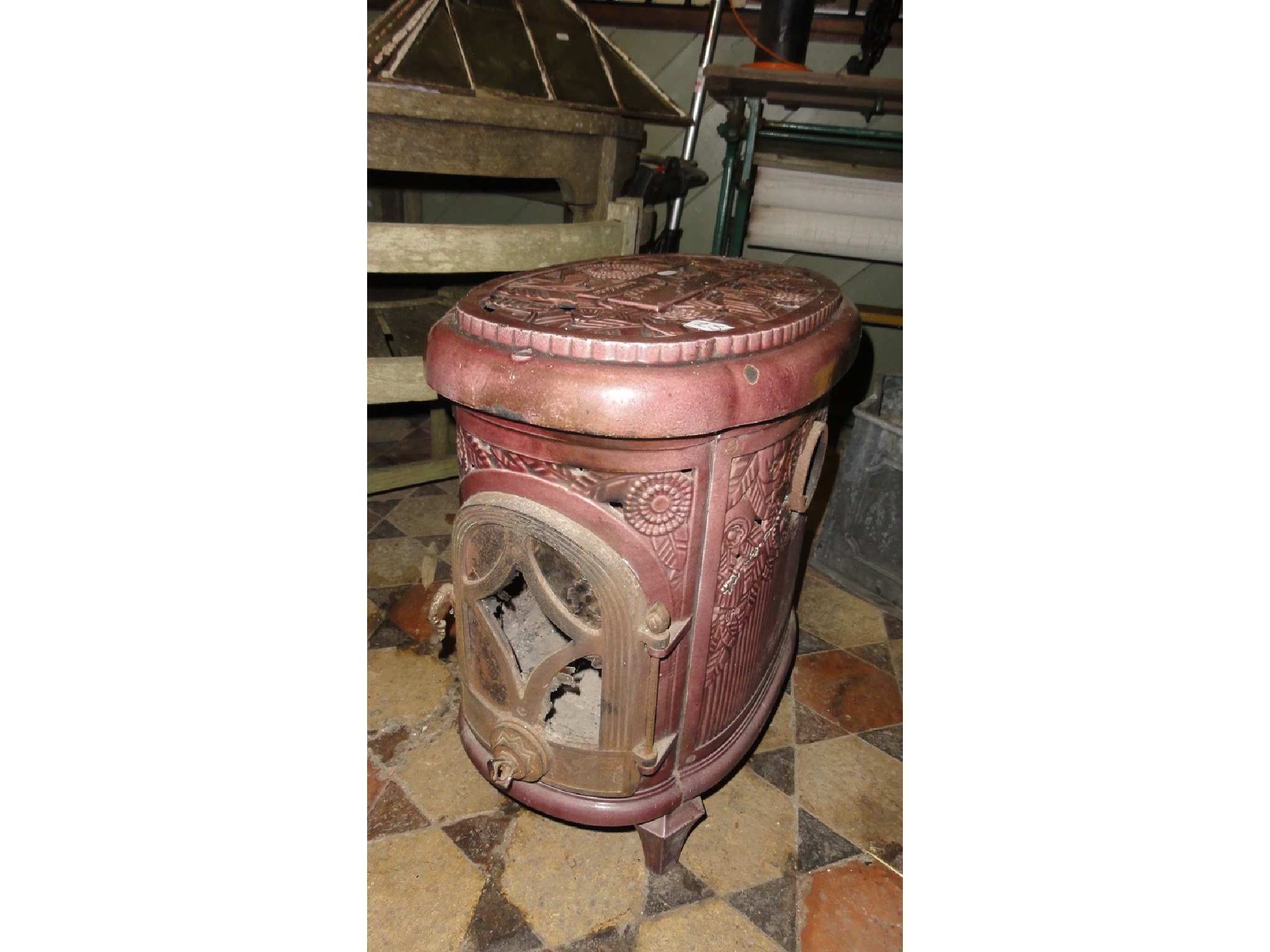 Appraisal: A vintage French cast iron and lilac coloured enamel stove