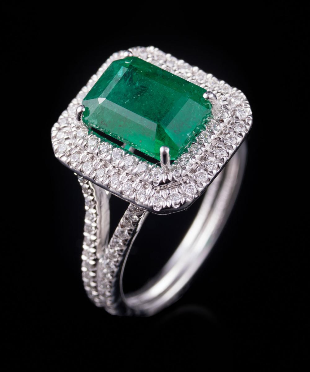 Appraisal: Platinum Emerald and Diamond Ring center prong set octagonal step