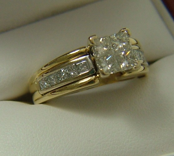 Appraisal: DIAMOND AND FOURTEEN KARAT GOLD RING set with princess-cut diamonds