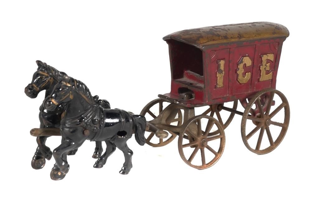 Appraisal: ANTIQUE CAST IRON HORSE TEAM ICE WAGONAntique cast iron horse-drawn