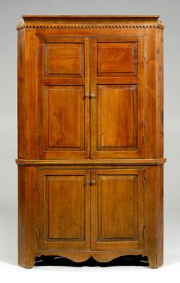 Appraisal: Southern paneled corner cupboard walnut with poplar secondary one-case construction