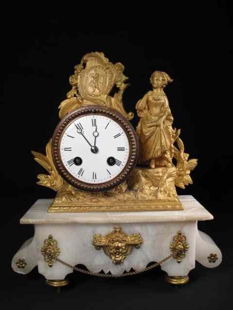 Appraisal: French alabaster mantle clock Gilt brass hardware accents Clock works