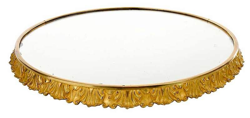 Appraisal: Gilt Bronze Plateau Mirror French th century shell and foliation