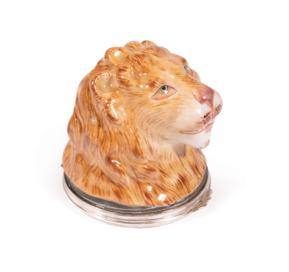 Appraisal: English Porcelain Silver-Mounted Lion's Head Snuff Box th c hand-painted