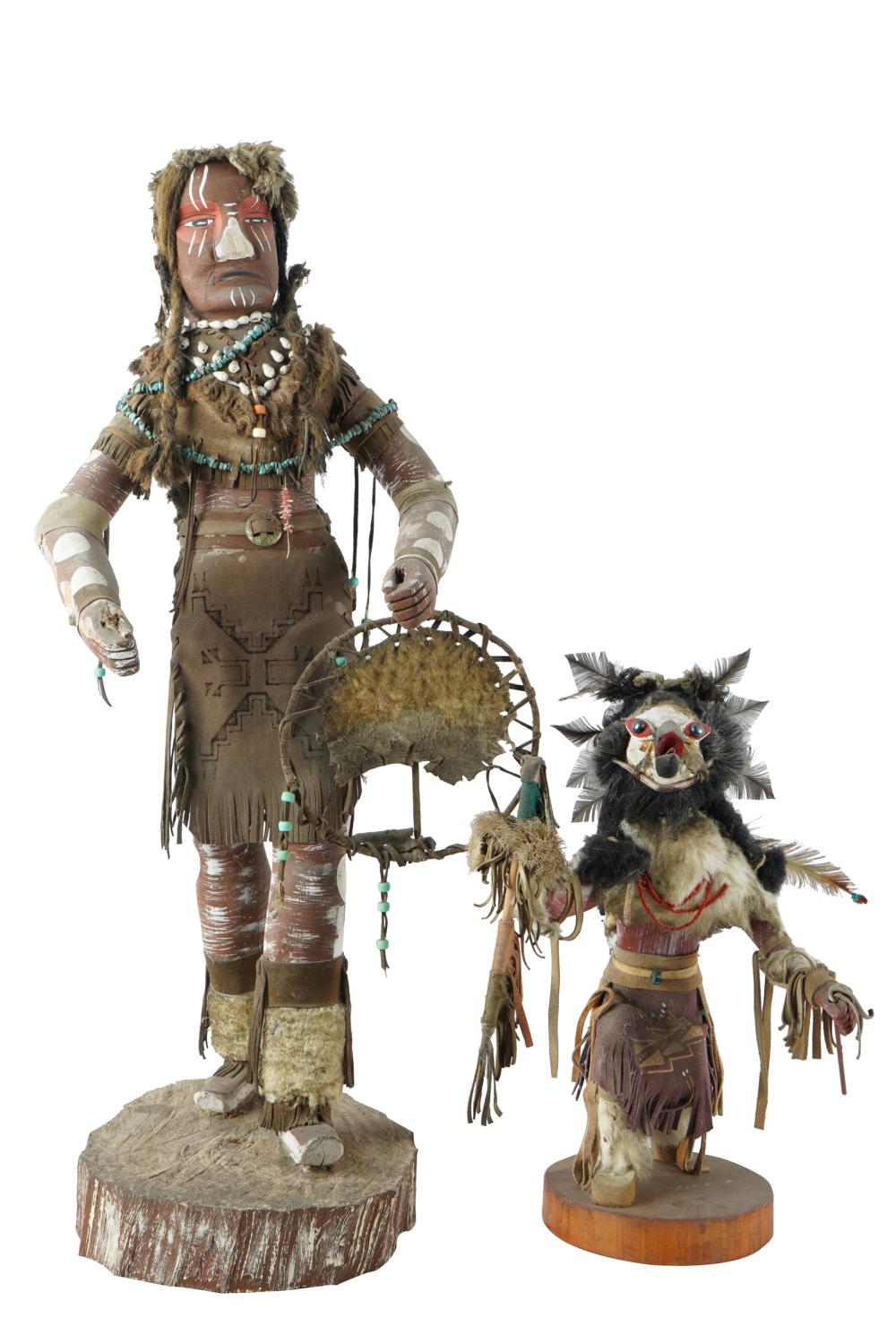 Appraisal: TWO KACHINA DOLLSpainted wood leather and other materials each mounted