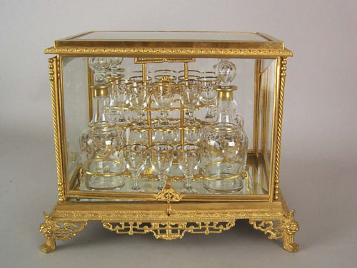 Appraisal: French gilt bronze glass cased cordial set late th c