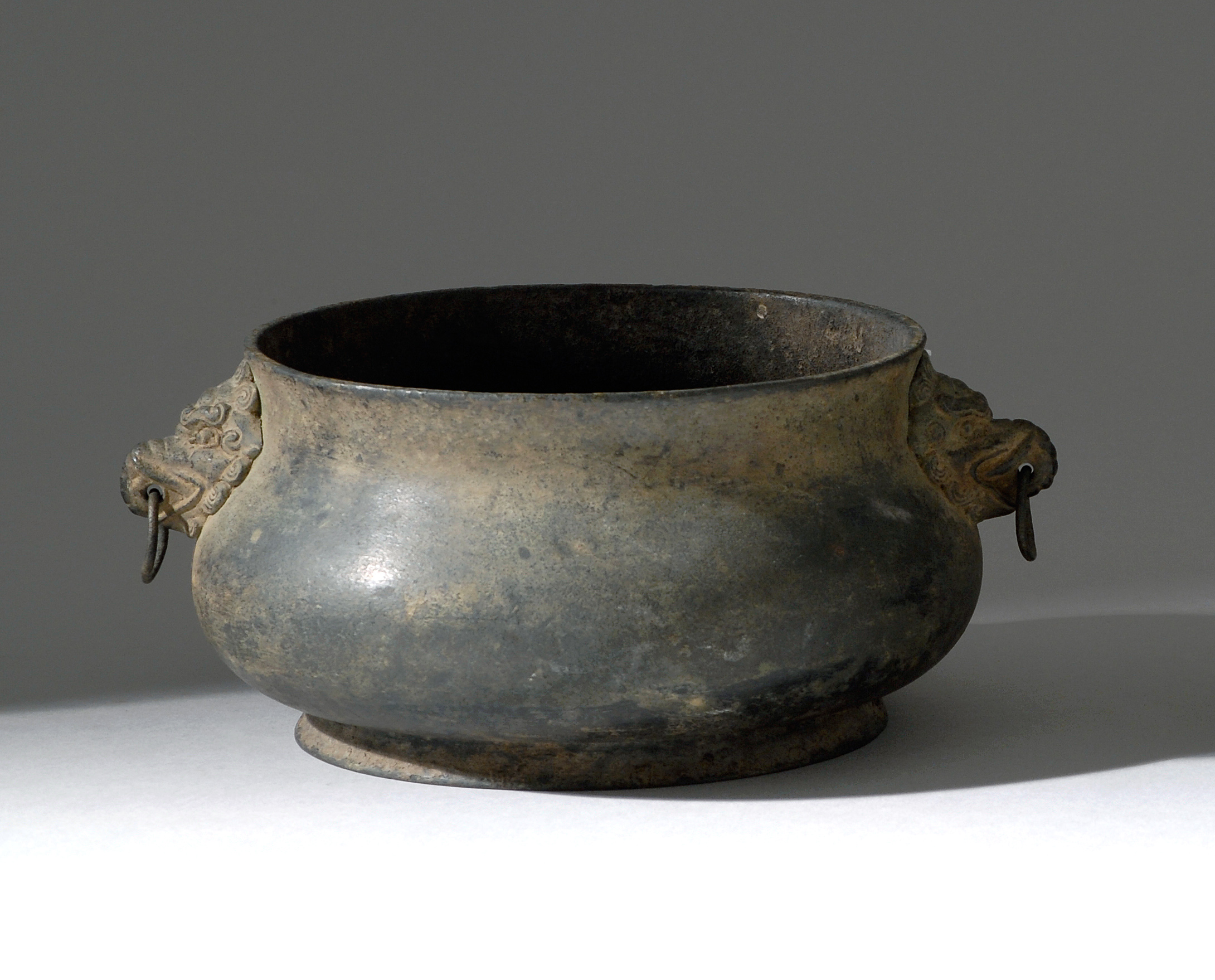 Appraisal: BRONZE CENSER Ming DynastyIn squat ovoid form with lion and