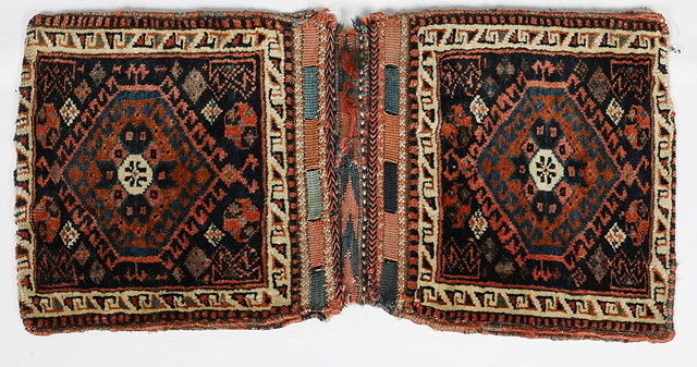 Appraisal: A NORTH WEST PERSIAN KHORJIN with flat weave back and