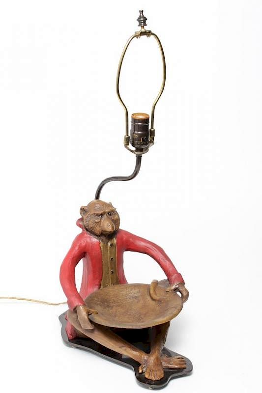 Appraisal: Bill Huebbe-Manner Cast Monkey Table Lamp Cast table lamp of