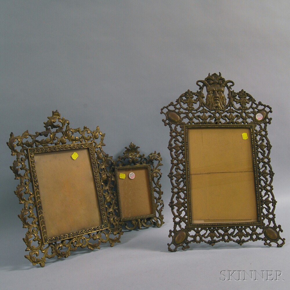 Appraisal: Three Brass Rococo-style Picture Frames lg to wd to in