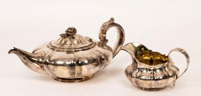 Appraisal: A George IV silver teapot and cream jug Charles Thomas