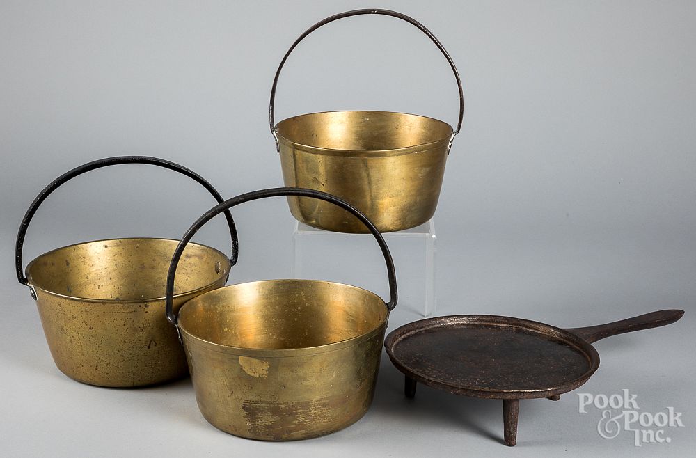 Appraisal: Three brass buckets with iron handles etc Three brass buckets