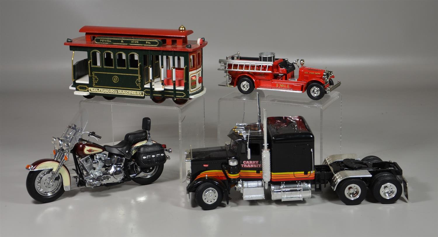 Appraisal: Scale model vehicles Ertl Seagrave Fire Truck Harley Davidson Heritage