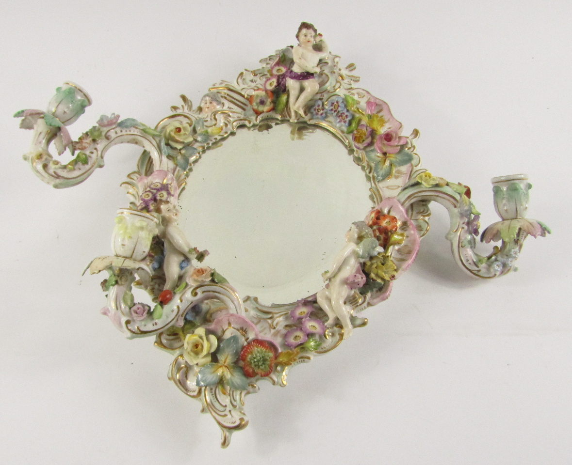 Appraisal: A Dresden porcelain early thC three branch girandole wall mirror