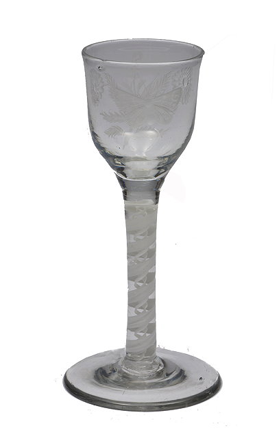 Appraisal: A GEORGIAN ALE GLASS with a spiral stem and engraved