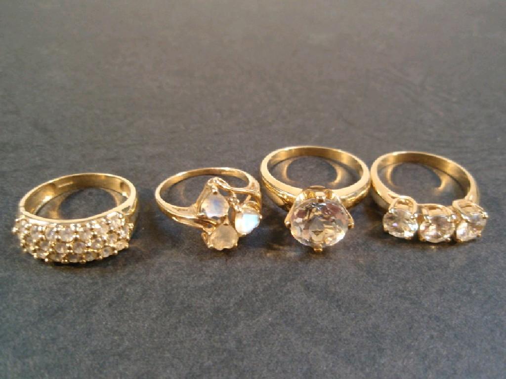 Appraisal: Four white stone set ct gold dress rings maker GTV