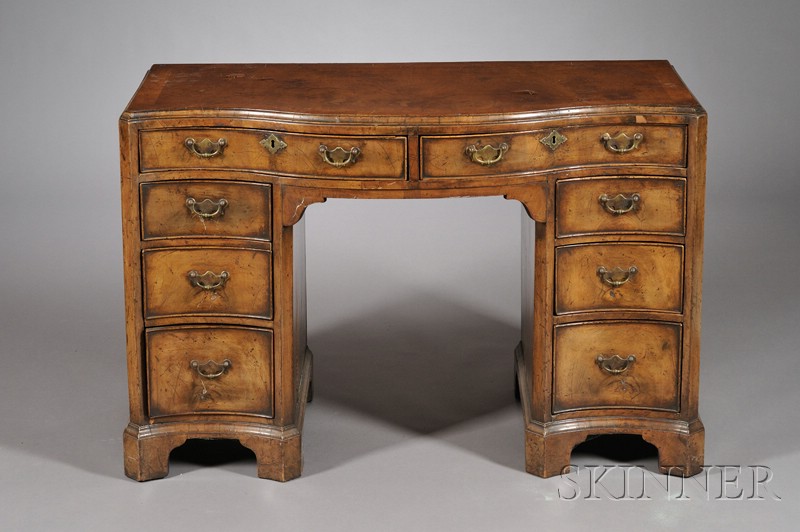 Appraisal: George III Style Mahogany Serpentine Desk late th century with