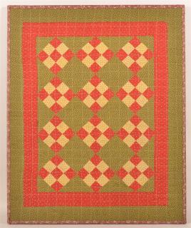 Appraisal: Diamond Block Pattern Crib Quilt Mounted on a wood stretcher