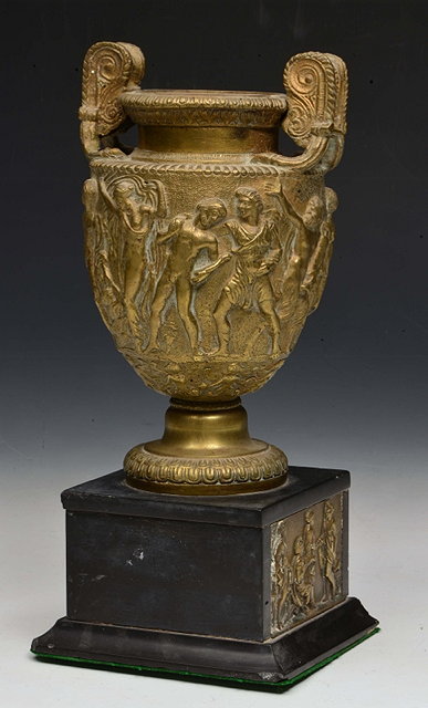 Appraisal: A HEAVY GILDED METAL TWO HANDLED CLASSICAL URN with figure