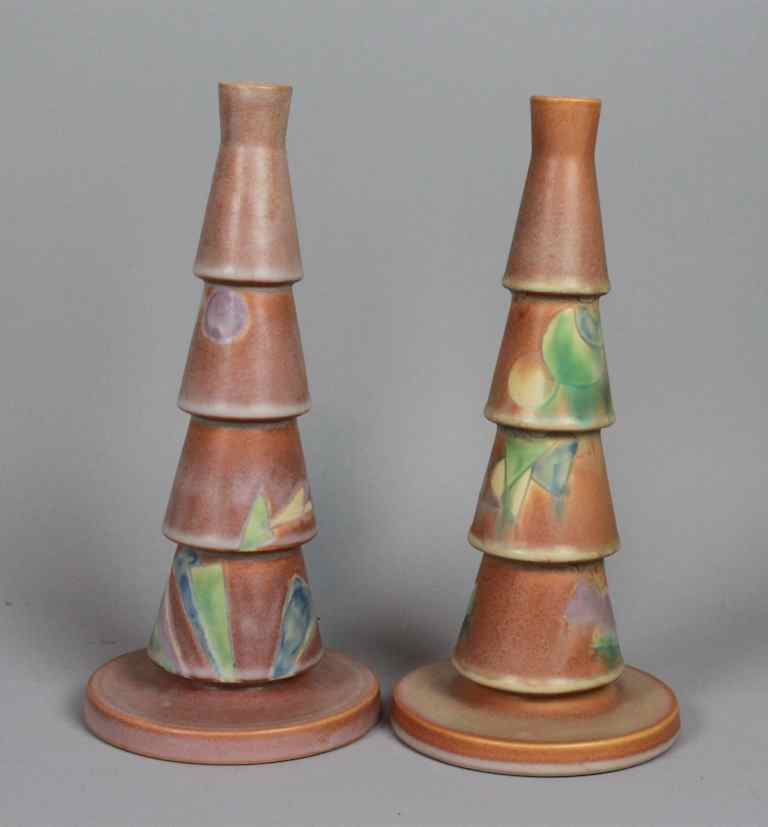 Appraisal: TWO ROSEVILLE POTTERY FUTURA PATTERN VASES circular footed vases with