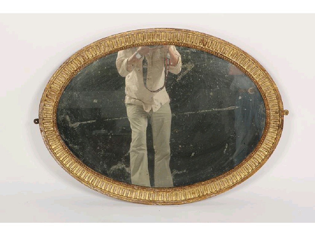 Appraisal: A GEORGE III STYLE OVAL WALL MIRROR the shaped plate