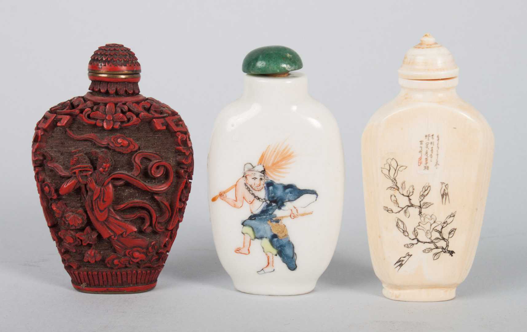 Appraisal: Three Chinese snuff bottles porcelain snuff bottle ivory snuff bottle