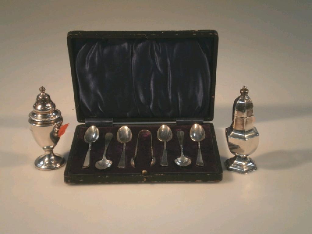 Appraisal: Two silver pepper pots and a cased set of six