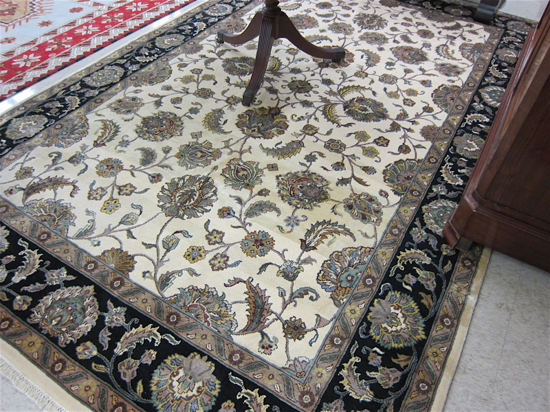 Appraisal: FINE HAND KNOTTED ORIENTAL CARPET Persian Isfahan design of floral