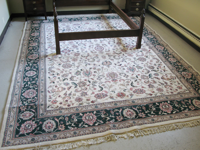 Appraisal: HAND KNOTTED ORIENTAL CARPET Indo-Kashan overall floral design on ivory