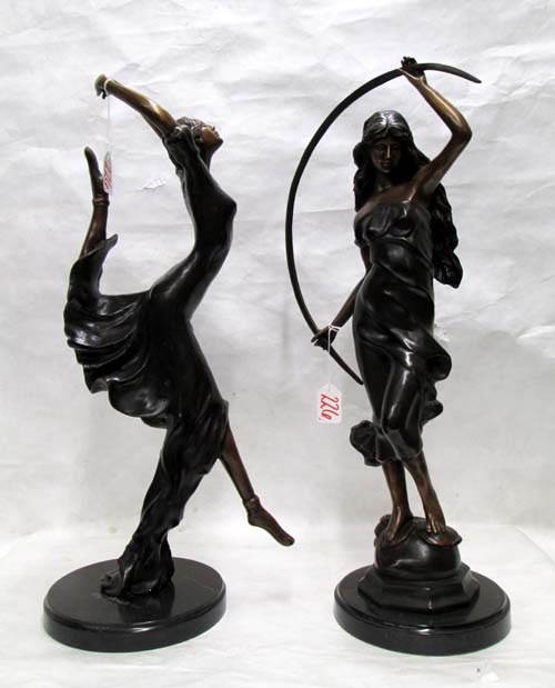 Appraisal: TWO BRONZE FIGURAL SCULPTURES each depicting a posed standing woman