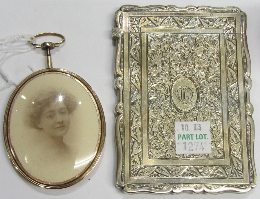 Appraisal: A gold cased and enameled oval portrait miniature frame the