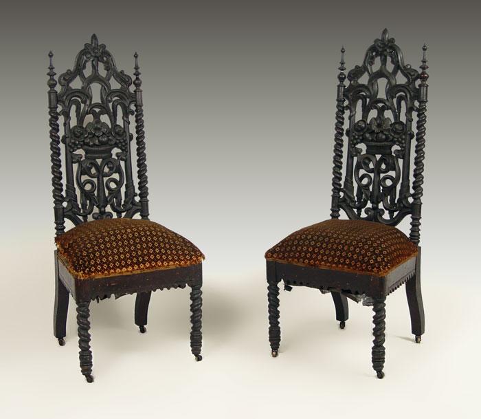 Appraisal: PAIR ELIZABETHAN CHAIRS Gothic cathedral type chairs with elaborate pierce