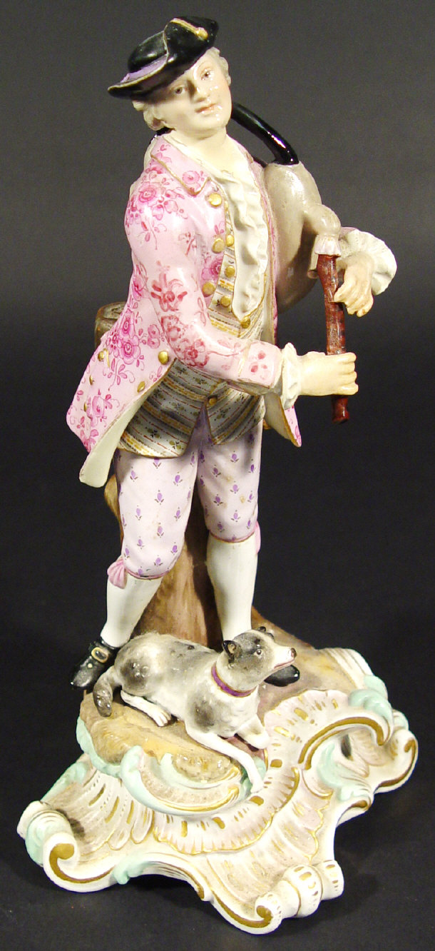 Appraisal: Meissen style porcelain bagpiper and dog on a Rococco style