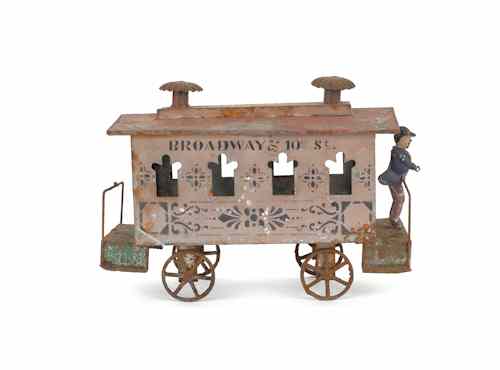 Appraisal: Painted tin trolley car th c Broadway th St h