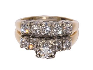 Appraisal: Diamond k yellow and white gold soldered wedding ring set