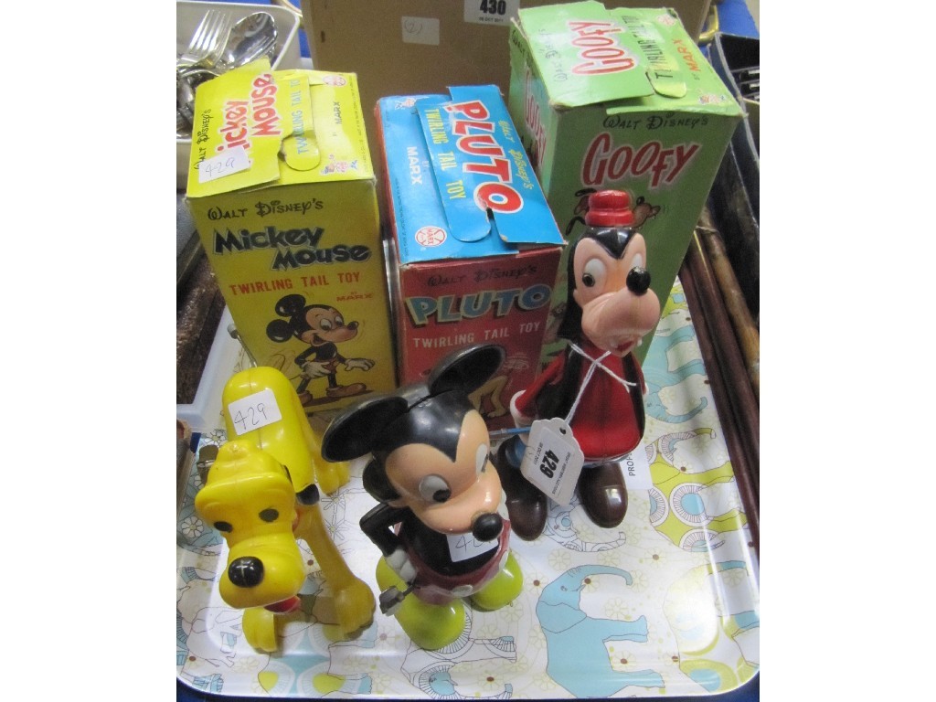 Appraisal: Lot comprising three Marx Disney Clockwork figures - Mickey Mouse