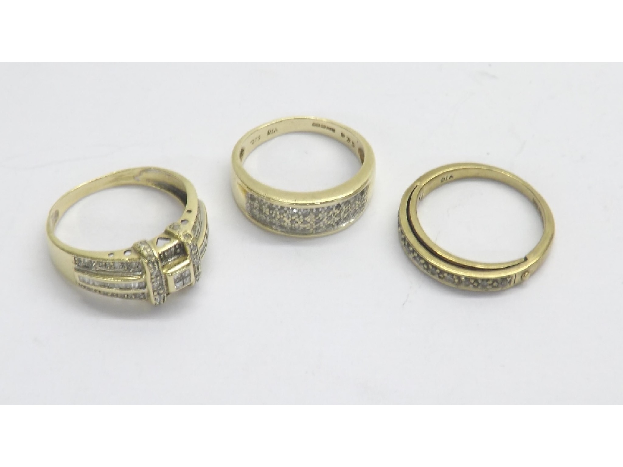 Appraisal: Three ct diamond set rings gm