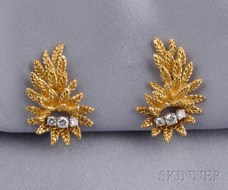 Appraisal: kt Gold and Diamond Earclips the leaf forms each set